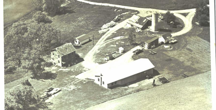 Old survey photo of the original farm, date unknown. 