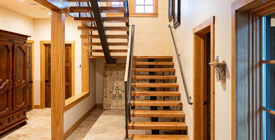 metal staircase with reclaimed barn wood treads,