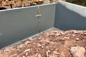 Pouring a new bank wall for the bank