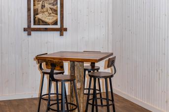 Bar-height table made from reclaimed barn wood