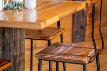 square bar table with stools made with reclaimed wood 