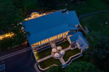 Aerial view of the restored Macungie barn at dusk