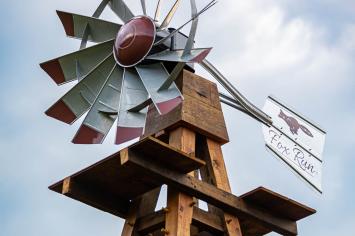 Windmill crafted from reclaimed barn beams
