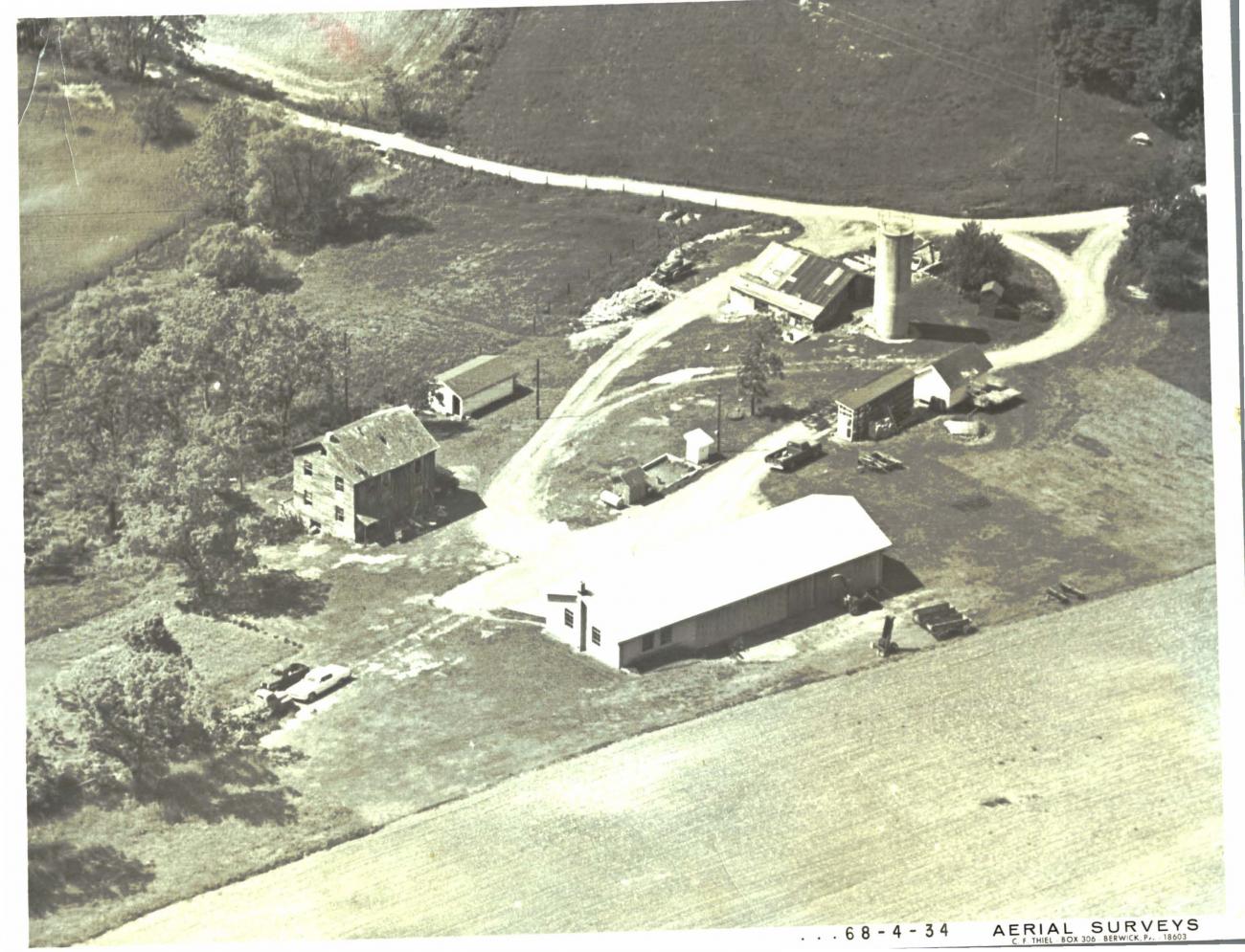 Old survey photo of the original farm, date unknown.